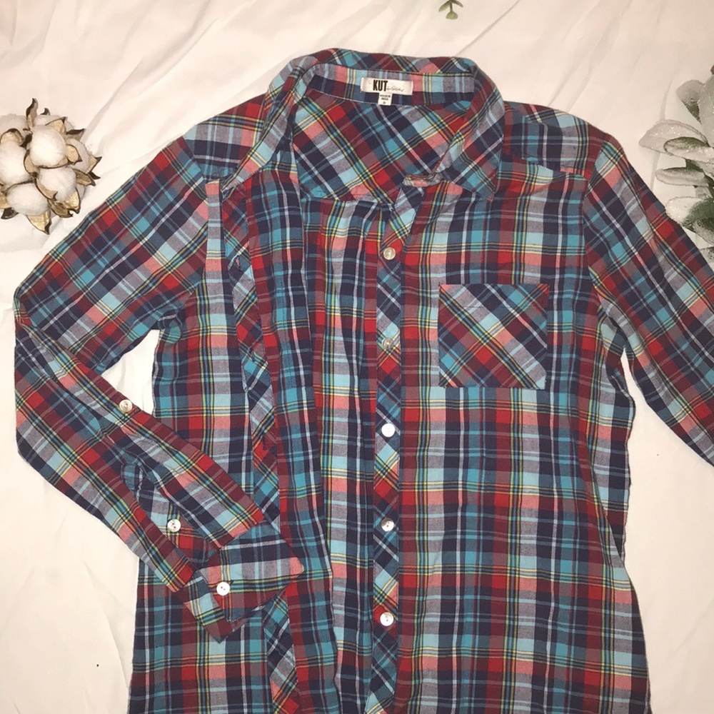 Blue/red plaid shirt.